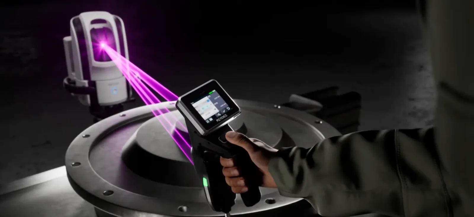 KEYENCE WM-6000 contact probe touching a large machined flange, the camera unit tracking it