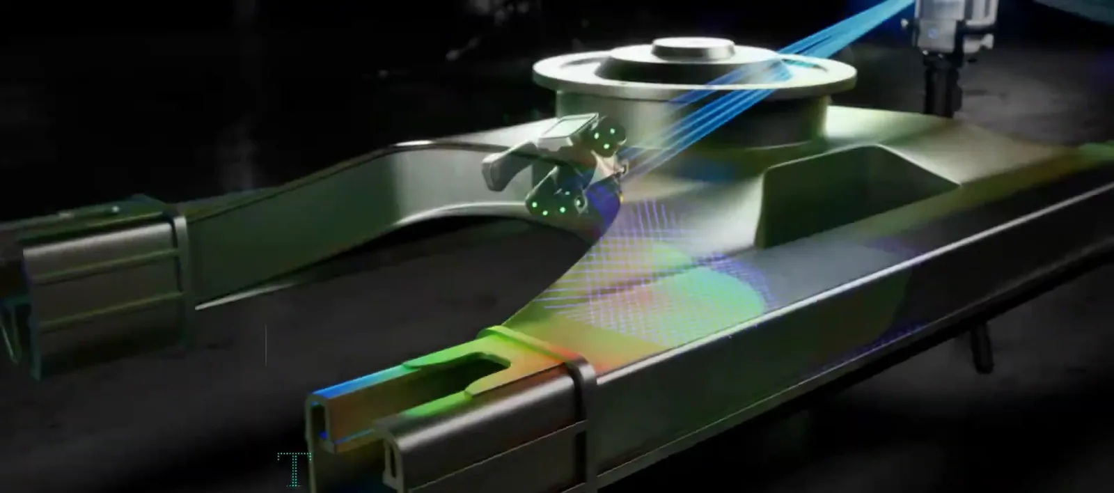 Laser-scanning a large cast arm, the scan data overlaid on the part