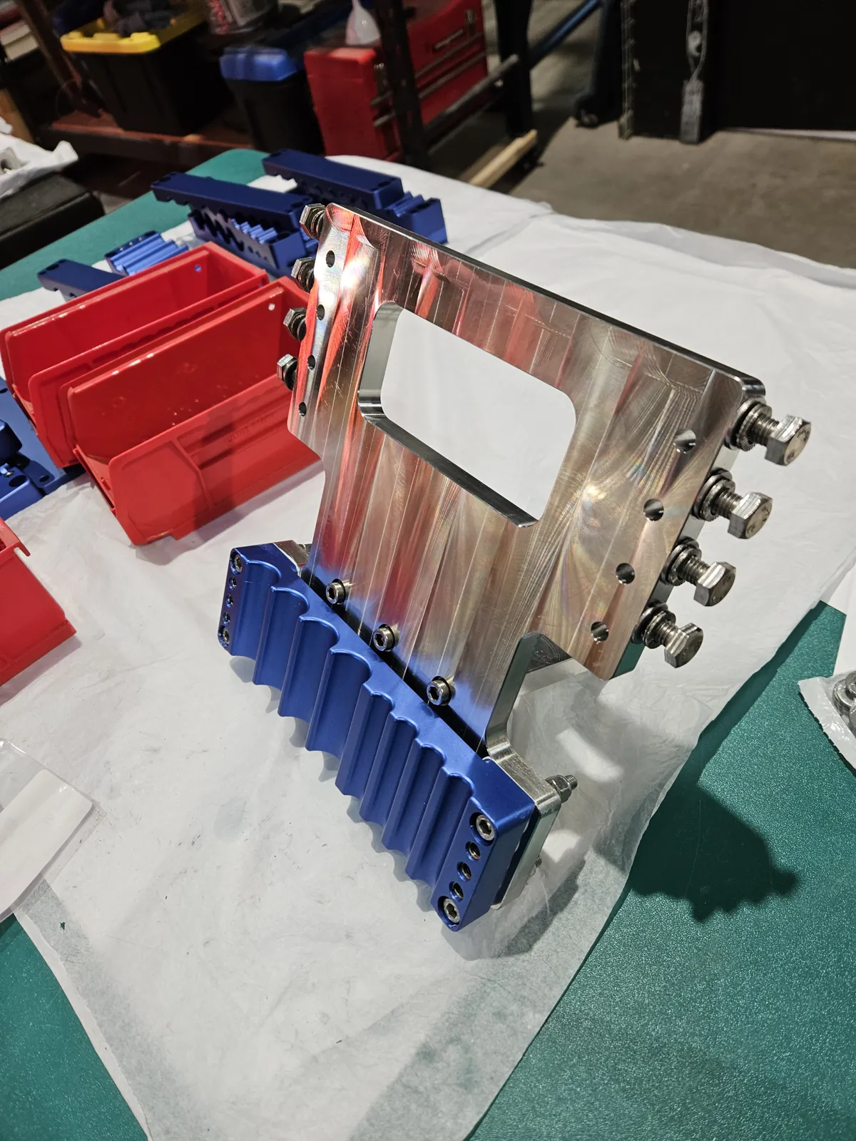 Blue and red anodized machined components