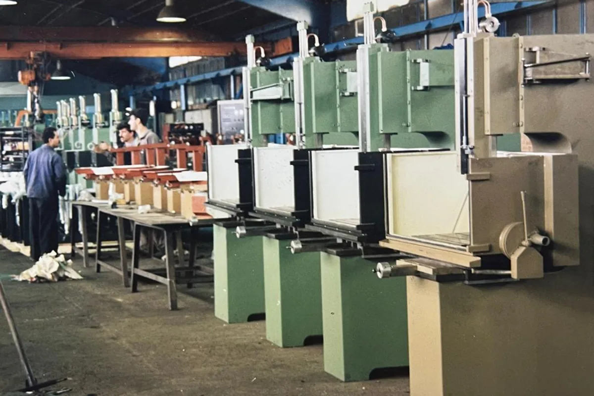 Pishtazan factory floor with a row of EDM machines being built, the Spark family's roots since 1983