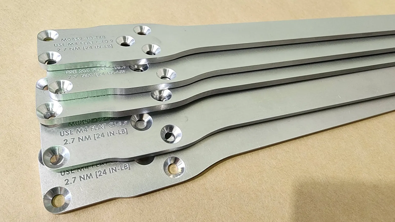 Laser marked aluminum bars with part numbers