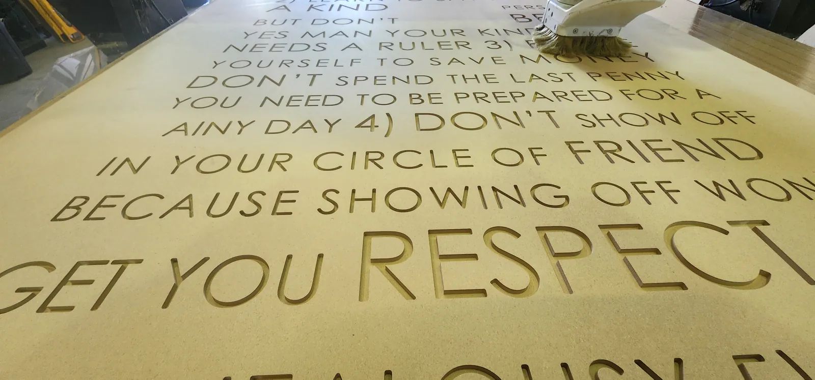 Laser engraved lettering on brass