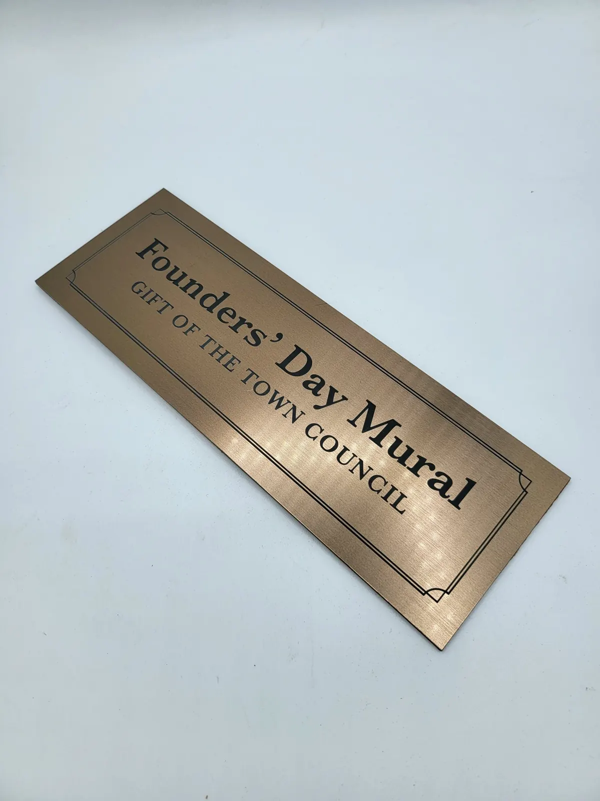 Engraved brass plaque, laser work by Spark Fabrication in Richmond, BC