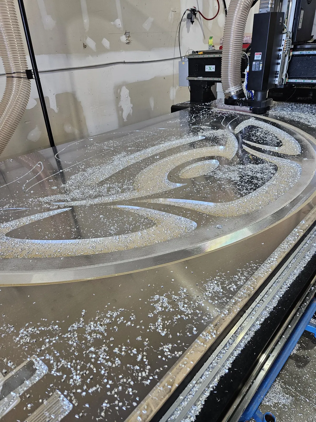 Routing an aluminum panel, routing work by Spark Fabrication in Richmond, BC