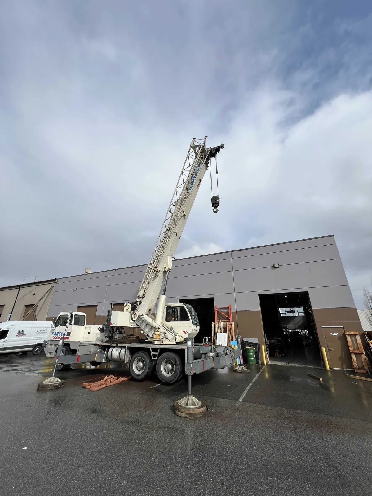 Mobile crane lifting a load at the Spark Fabrication shop in Richmond, BC