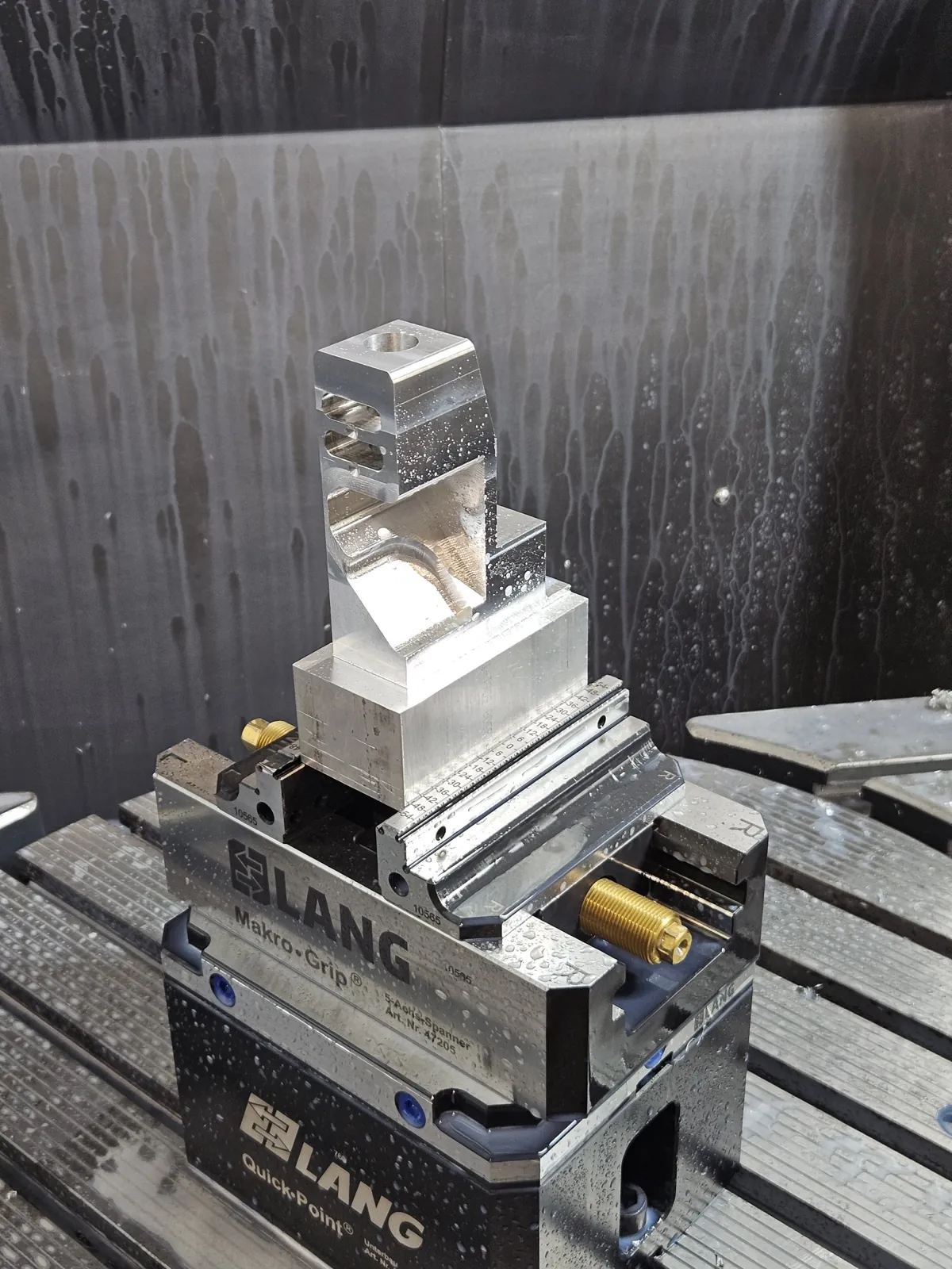 Aluminum part held in a 5-axis vise on the DMU 75 table