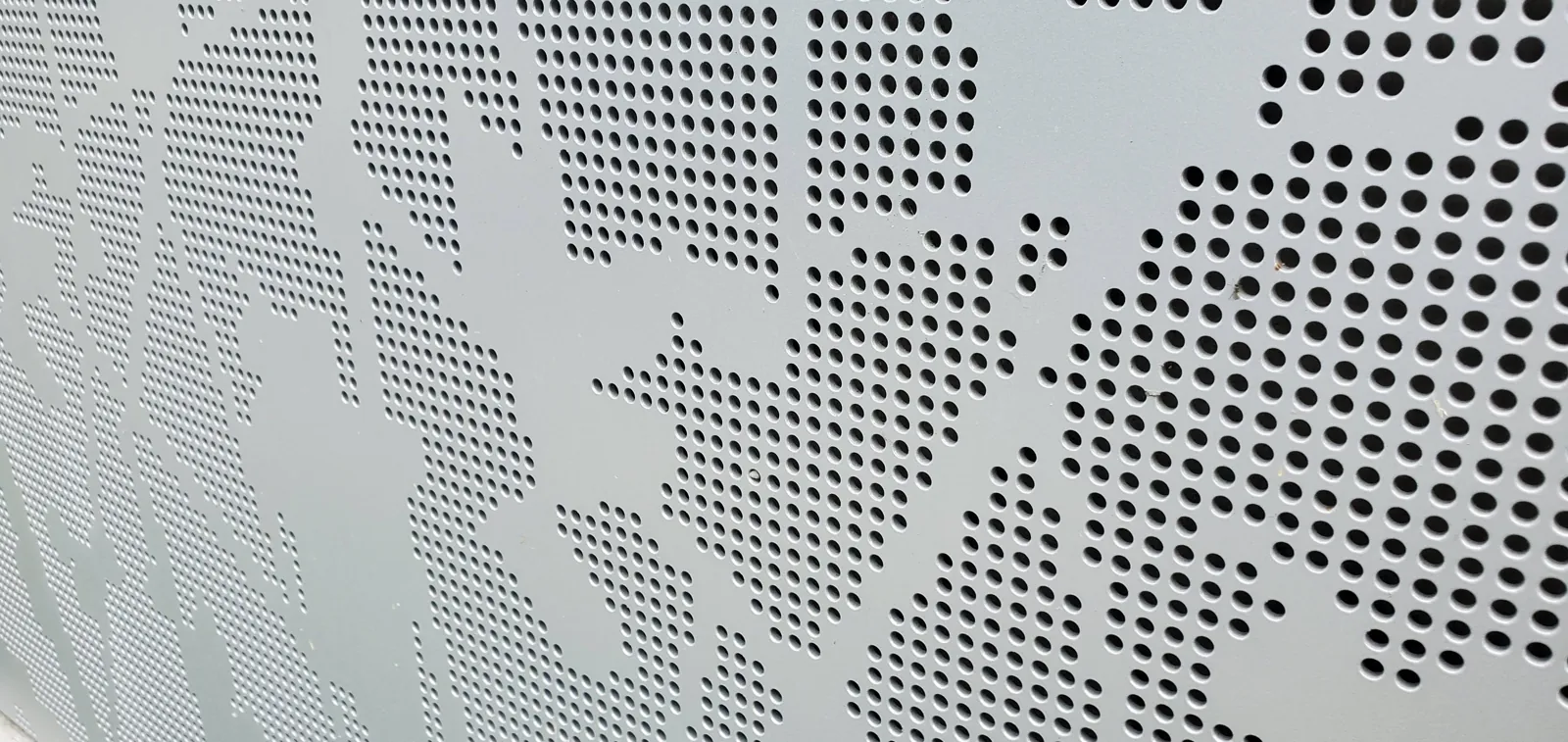 Perforated decorative sheet metal panel