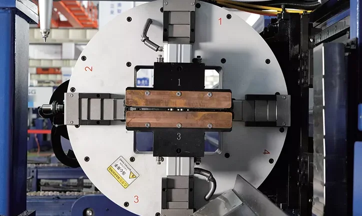 Tube laser chuck with copper anti-burn jaws